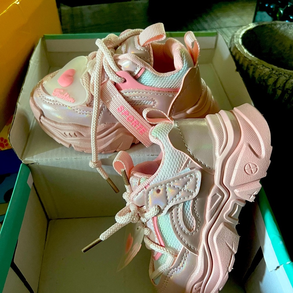 Toddler sneakers euro size 21 and 23.  Multi-colored, thick sole.